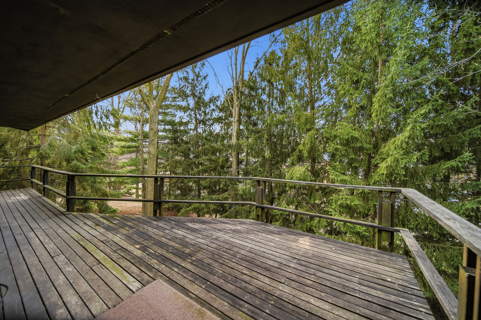 604 Hillandale Court Morrison, IL 61270 - Photo 17 of 35 a view of a balcony with wooden floor