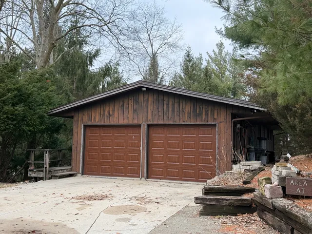 a front view of house with garage