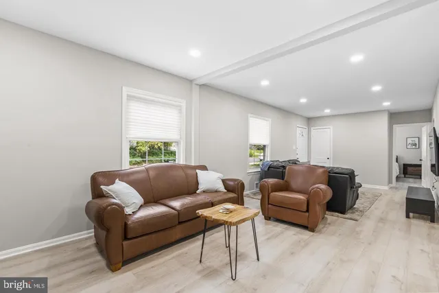 a living room with furniture and a couch