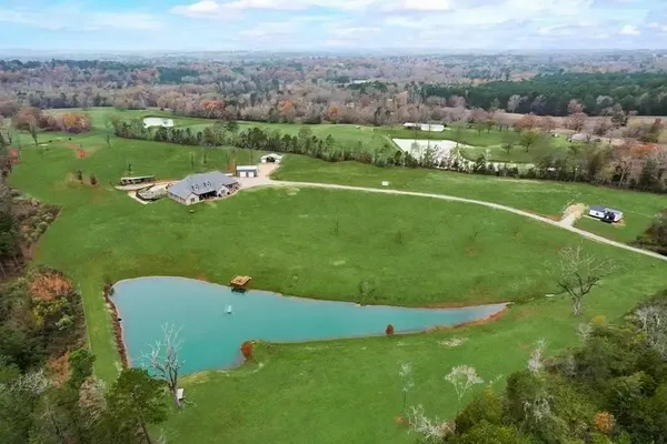 an aerial view of a house with a garden