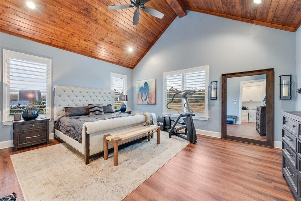 10794 County Road 334 Tyler, TX 75708 - Photo 22 of 40 a bedroom with furniture and wooden floor