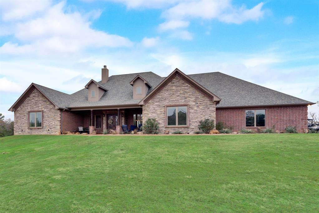 10794 County Road 334 Tyler, TX 75708 - Photo 6 of 40 front view of a house with a yard