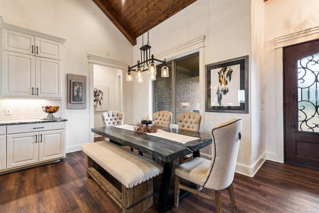 10794 County Road 334 Tyler, TX 75708 - Photo 9 of 40 a view of a kitchen area with furniture and wooden floor