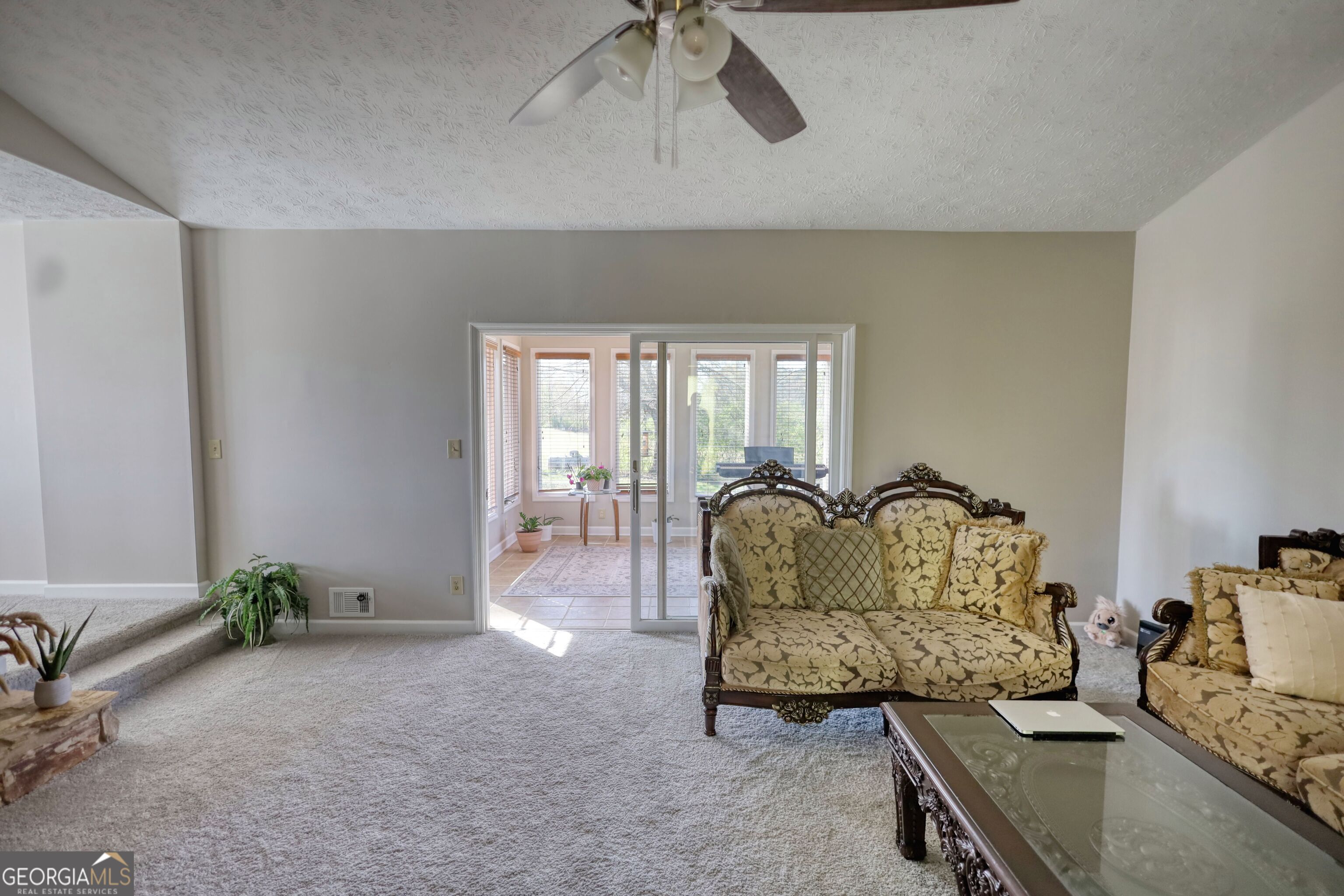 610 Loth Wages Road Dacula, GA 30019 - Photo 12 of 70 a living room with furniture