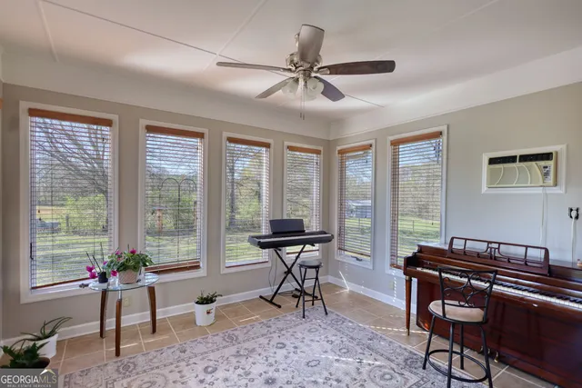 a view of a dining room with furniture wooden floor and a chandelier