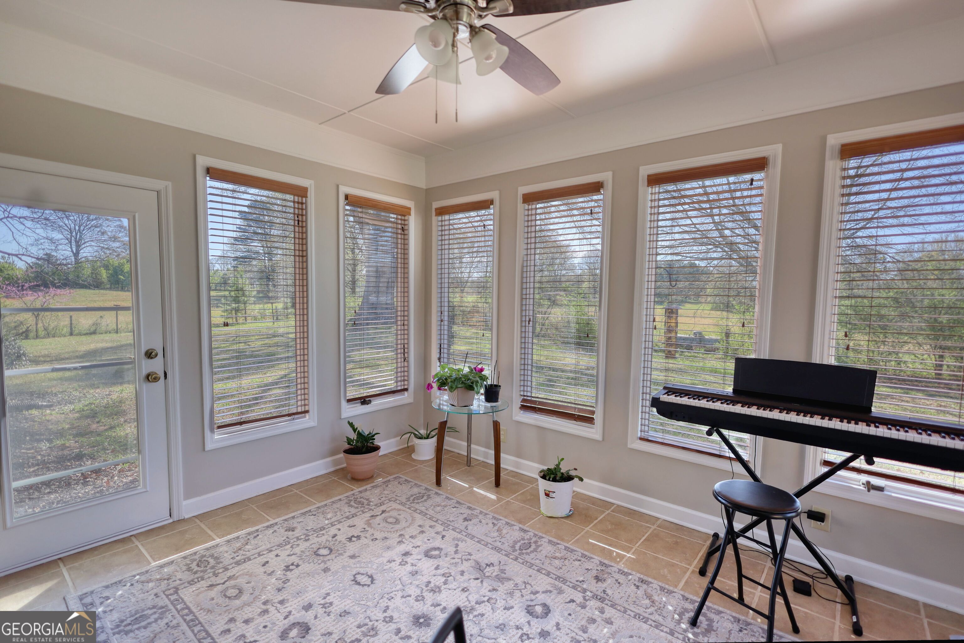 610 Loth Wages Road Dacula, GA 30019 - Photo 15 of 70 a living room with furniture and a window