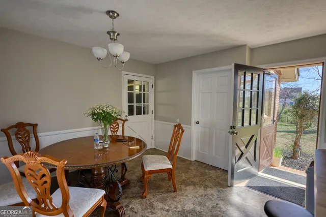a bedroom with a bed and ceiling fan