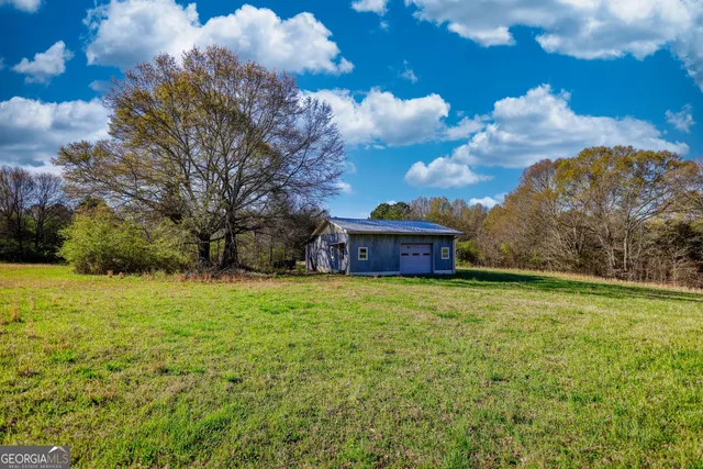 a view of an ocean and a yard