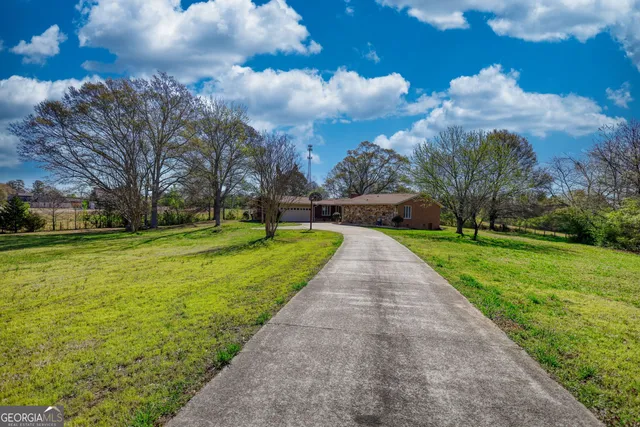 a front view of house with garden