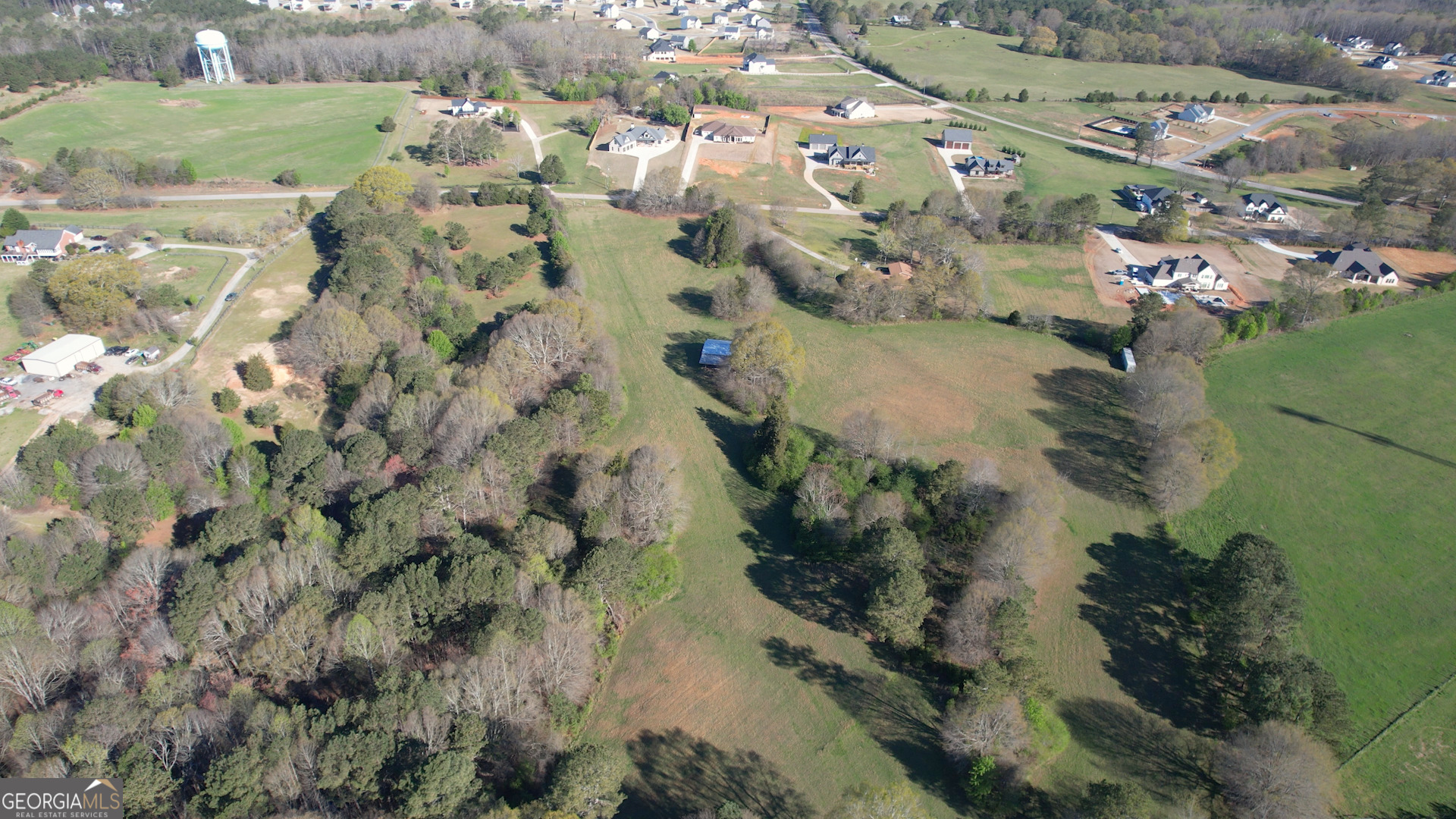 610 Loth Wages Road Dacula, GA 30019 - Photo 52 of 70 an aerial view of a house with a yard