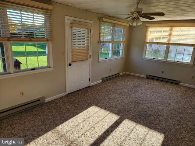 an empty room with windows