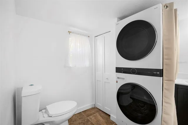 a bathroom with a toilet and a sink