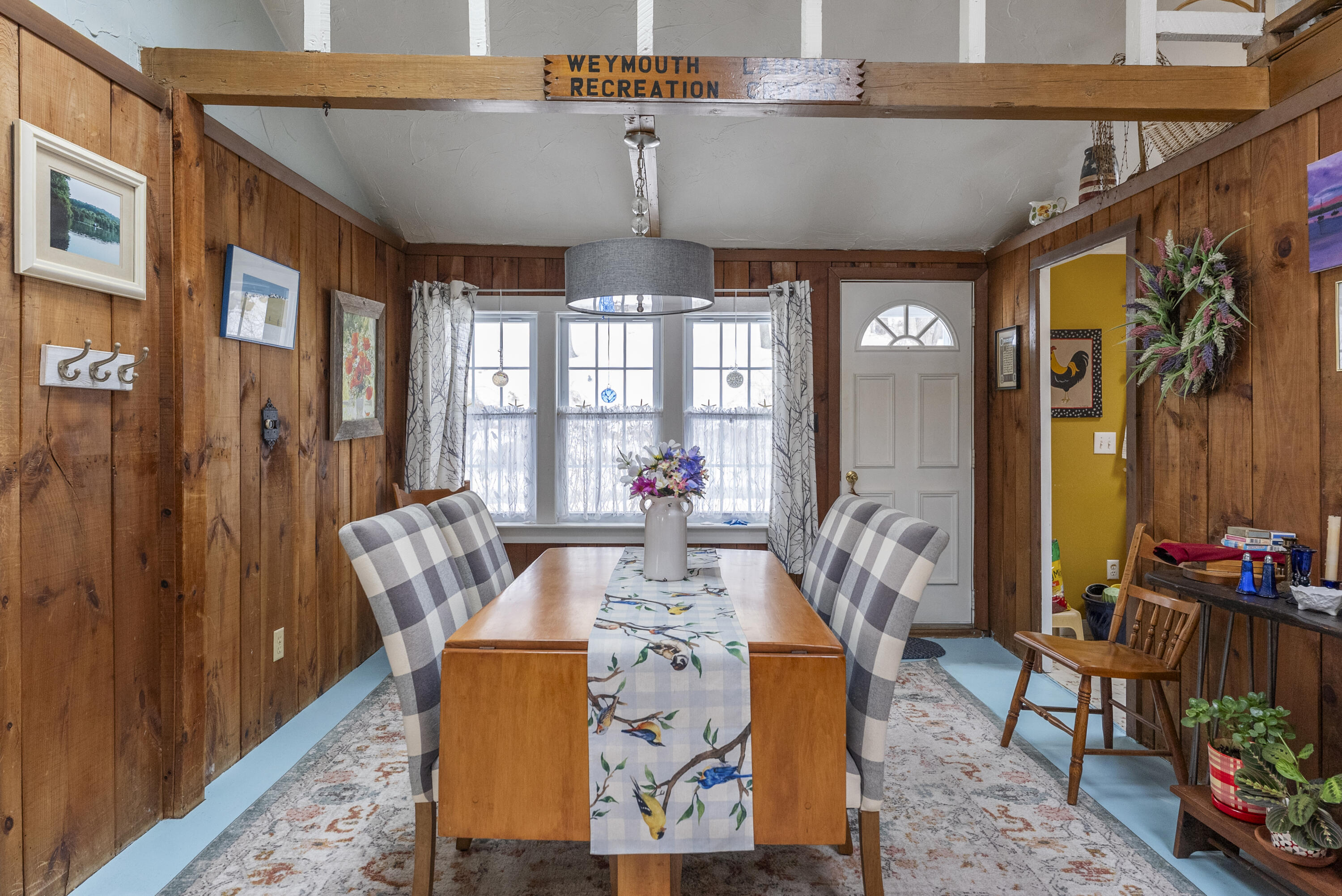 24 E Road Mashpee, MA 02649 - Photo 18 of 43 a view of a dining room with furniture window and outside view