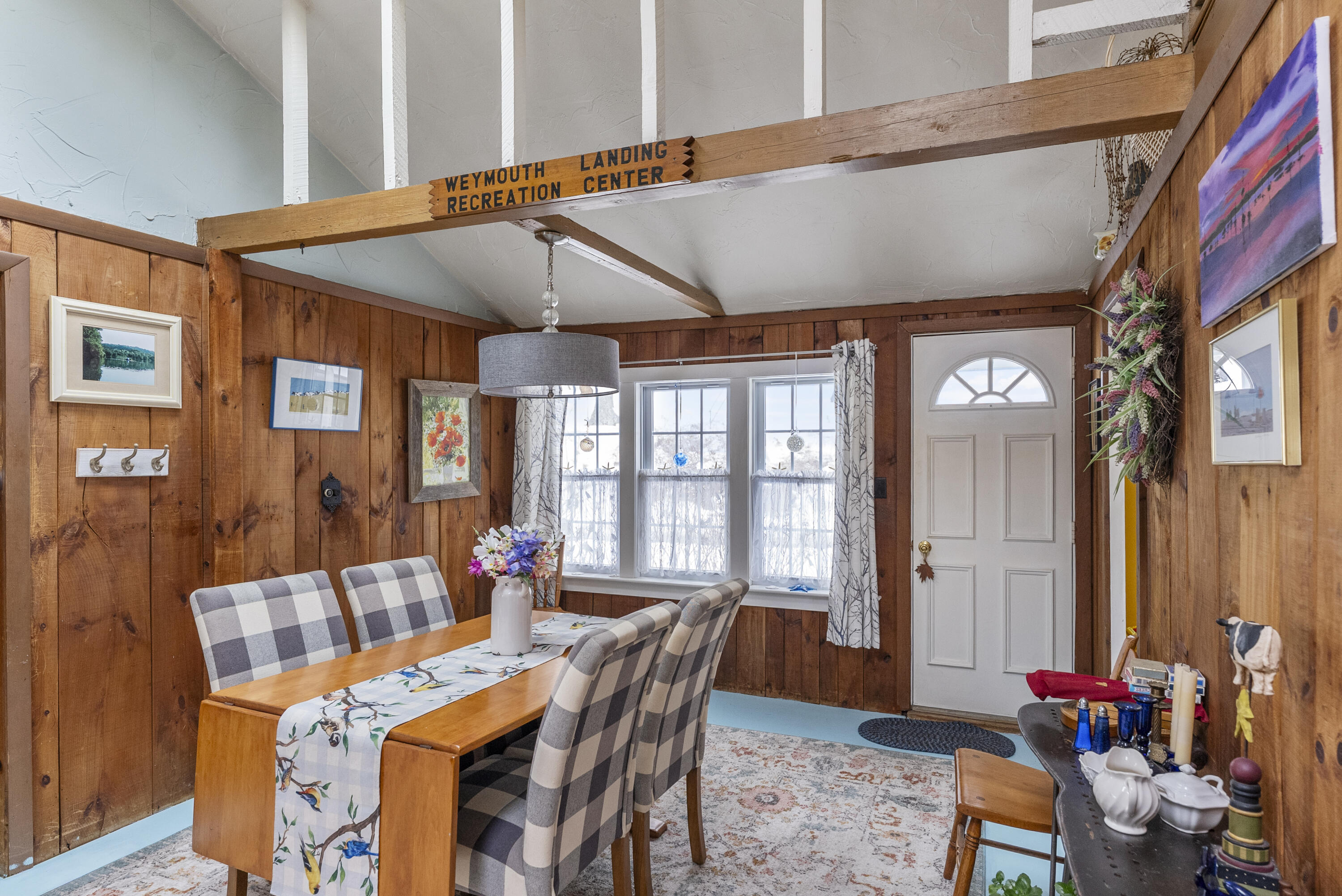 24 E Road Mashpee, MA 02649 - Photo 19 of 43 a dining room with furniture window and outdoor view
