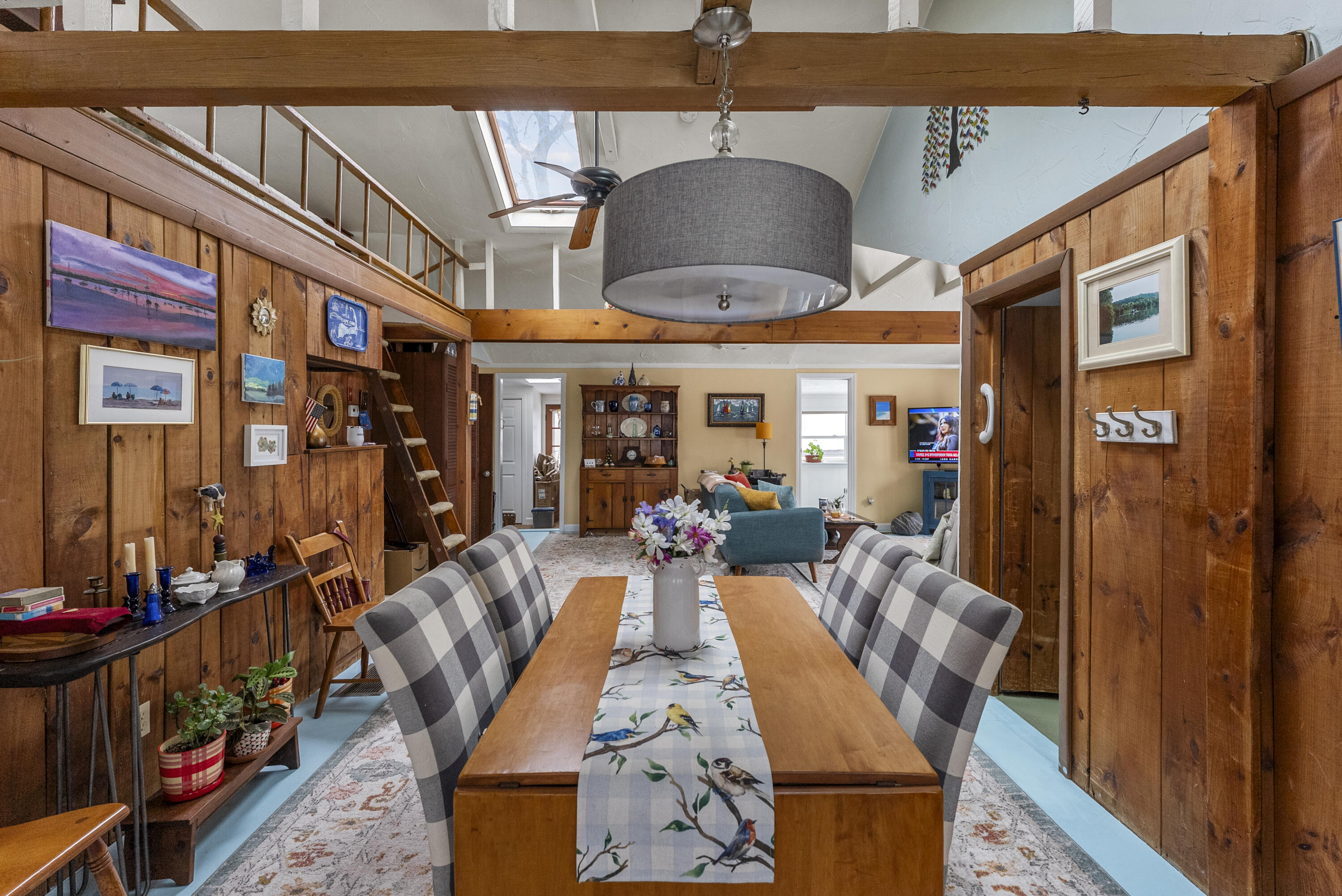 24 E Road Mashpee, MA 02649 - Photo 21 of 43 a dining area with stainless steel appliances granite countertop a dining table and chairs
