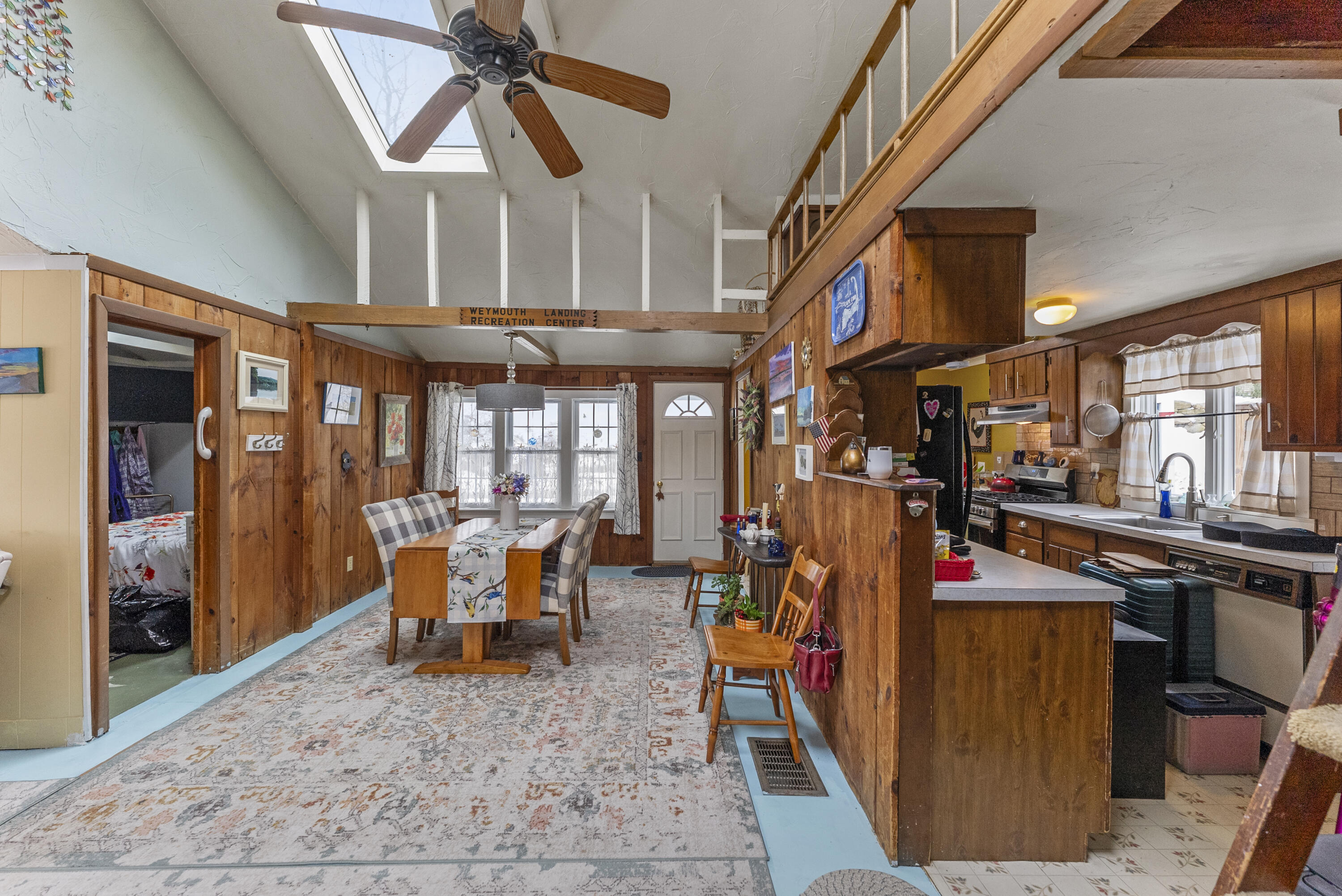 24 E Road Mashpee, MA 02649 - Photo 24 of 43 a view of a chairs and tables in patio next to a building