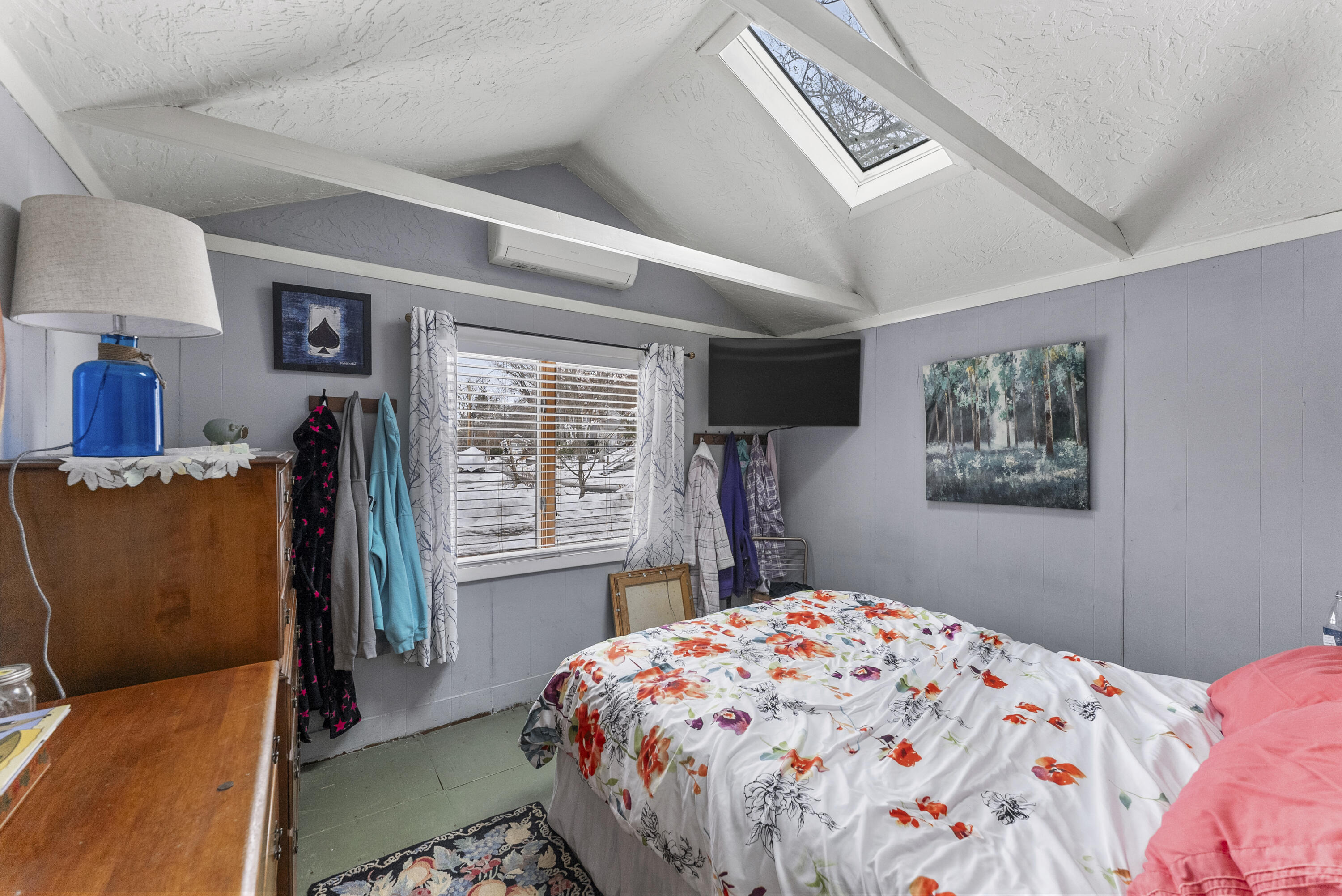 24 E Road Mashpee, MA 02649 - Photo 28 of 43 a bedroom with a large bed and a window