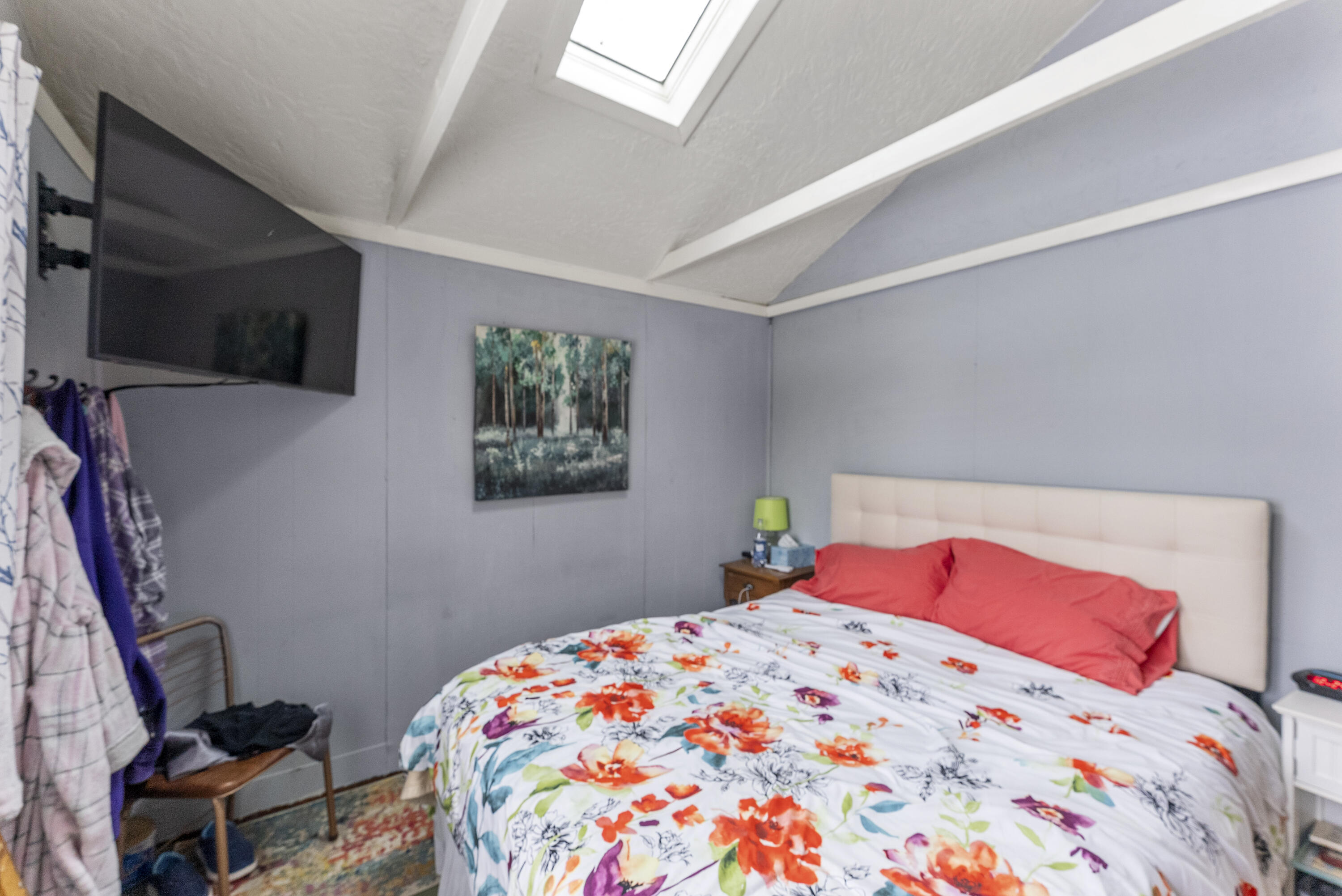 24 E Road Mashpee, MA 02649 - Photo 29 of 43 a bedroom with a bed and a flat screen tv