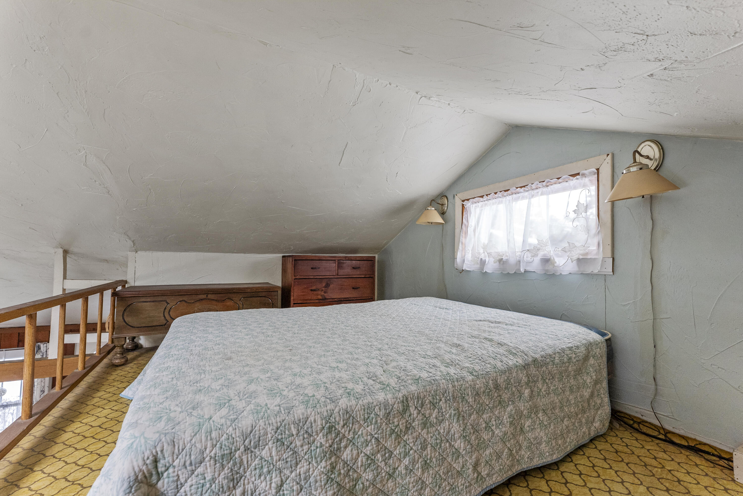 24 E Road Mashpee, MA 02649 - Photo 36 of 43 a bedroom with a bed and window