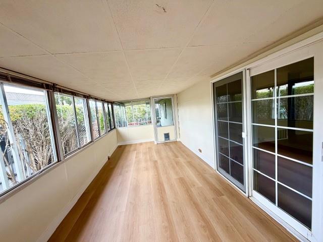 225 Mt Hermon Road, Unit 217 Scotts Valley, CA 95066 - Photo 12 of 29 a view of balcony with wooden floor and windows