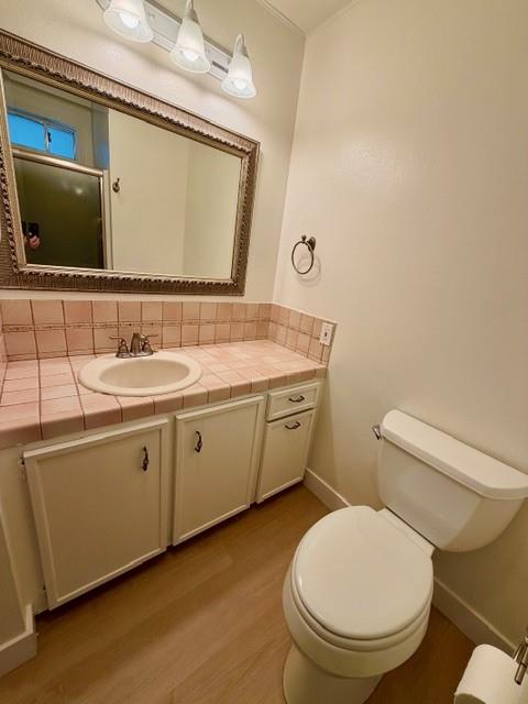 225 Mt Hermon Road, Unit 217 Scotts Valley, CA 95066 - Photo 25 of 29 a bathroom with a toilet sink and mirror