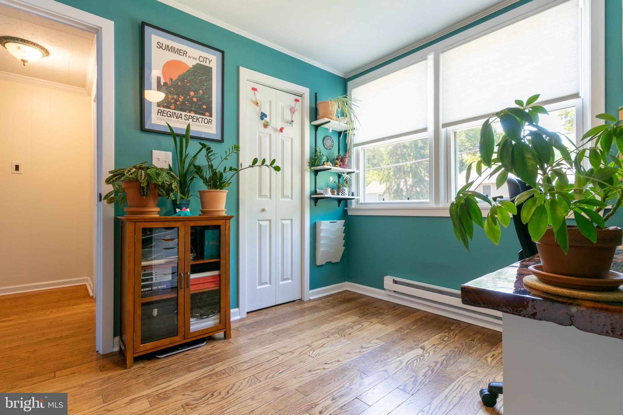 62 F Ridge Road Greenbelt, MD 20770 - Photo 15 of 22 a view of a living room with furniture and a potted plant
