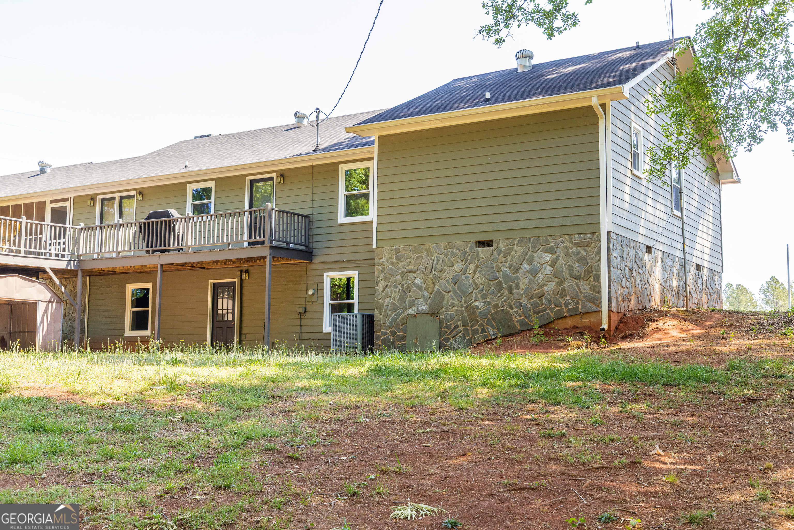 976 Windsweep Farm Road Thomaston, GA 30286 - Photo 49 of 64 a view of a house with a yard