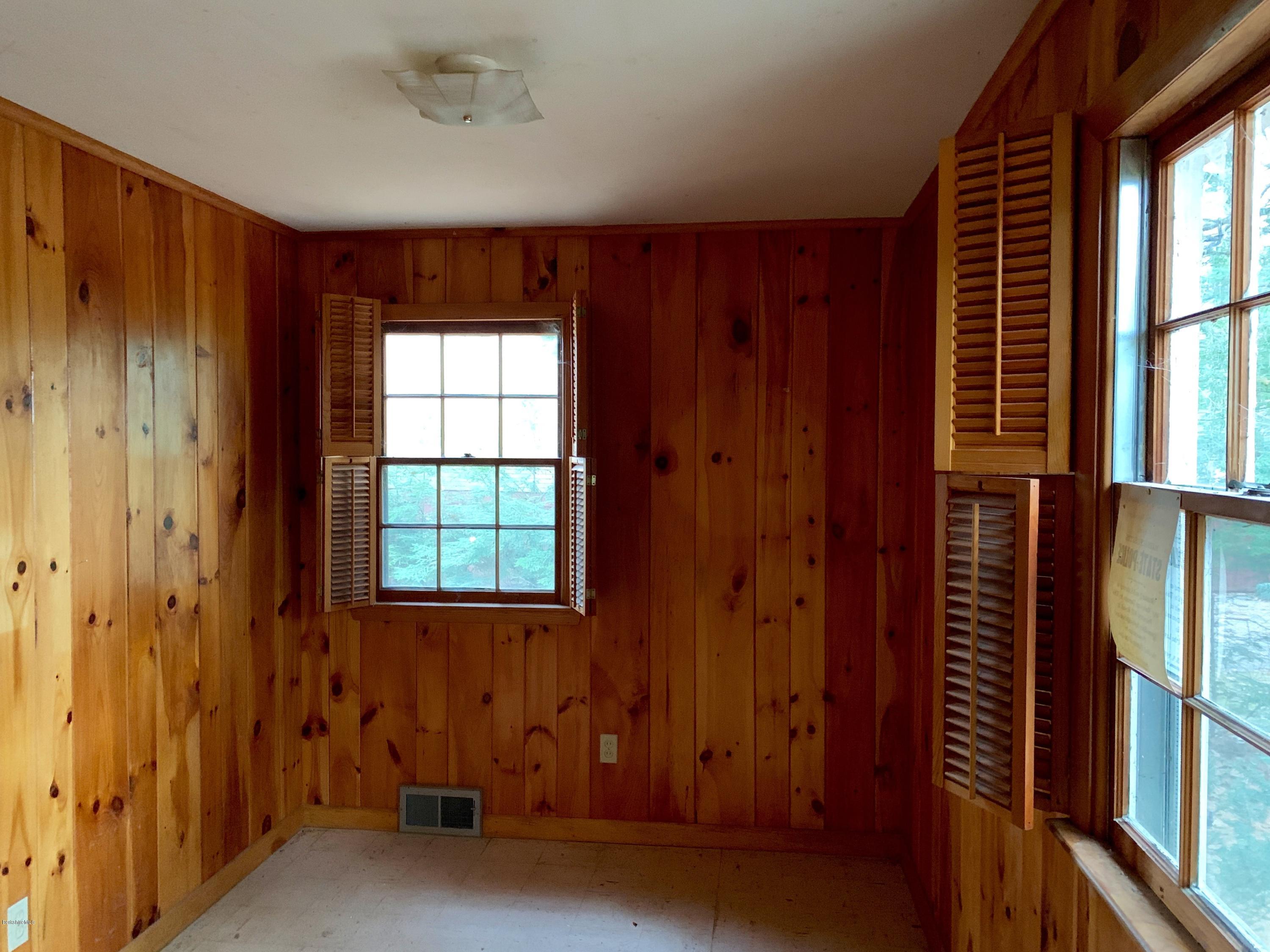 21 Point Road Monterey, MA 01245 - Photo 16 of 25 wooden floor and windows in a room