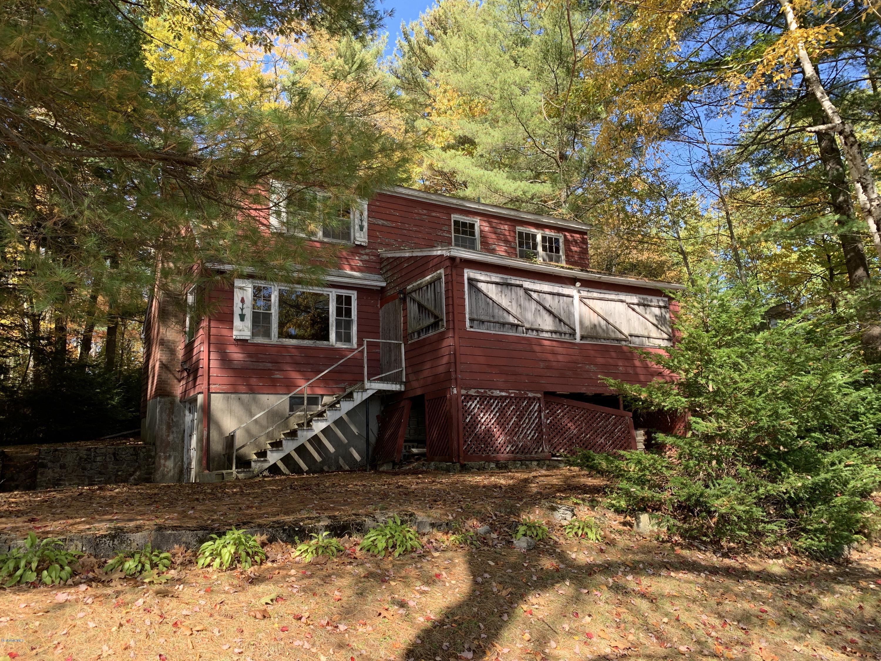 21 Point Road Monterey, MA 01245 - Photo 4 of 25 front view of a house with a yard