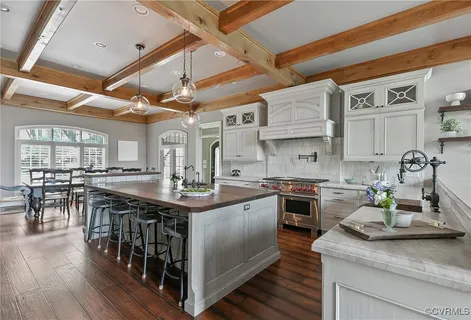 a view of cabinets a window and a kitchen counter