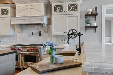 a bathroom with a sink and a window