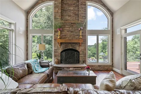 a bathroom with a tub shower and sink