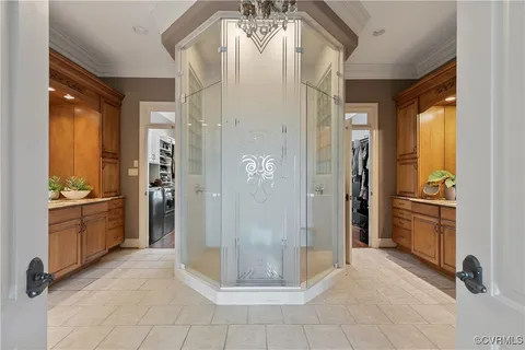 a kitchen with sink and cabinets