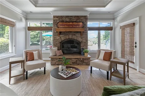 an aerial view of a house with swimming pool and outdoor space
