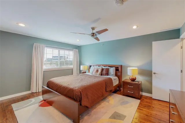 a bed room with a bed and a window