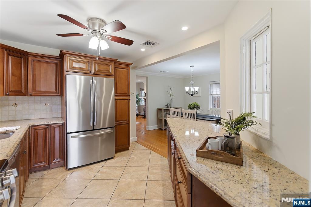 31 Martin Terrace Hackensack, NJ 07601 - Photo 11 of 32 a view of a kitchen with granite countertop stainless steel appliances and a counter space