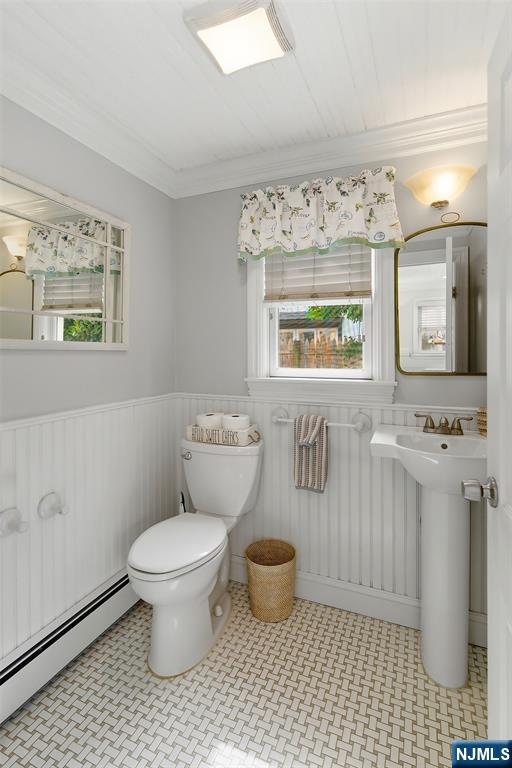 31 Martin Terrace Hackensack, NJ 07601 - Photo 15 of 32 a bathroom with a toilet sink and mirror