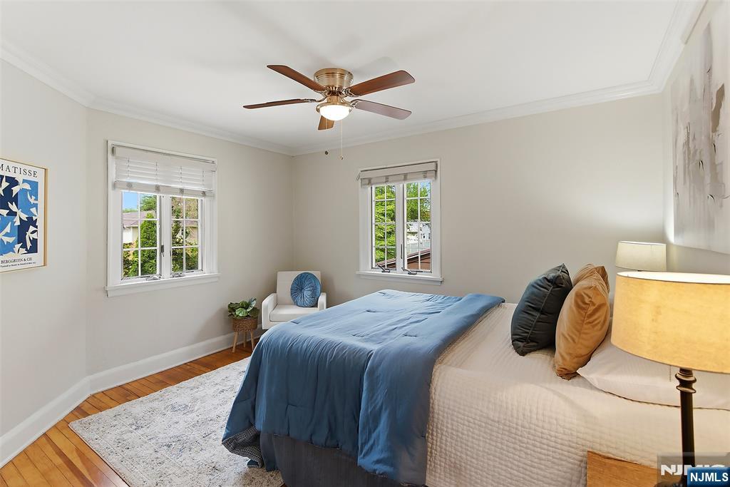 31 Martin Terrace Hackensack, NJ 07601 - Photo 17 of 32 a bedroom with a bed and window