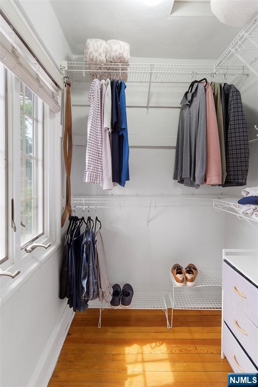 31 Martin Terrace Hackensack, NJ 07601 - Photo 21 of 32 a view of walk in closet with clothes and shoes