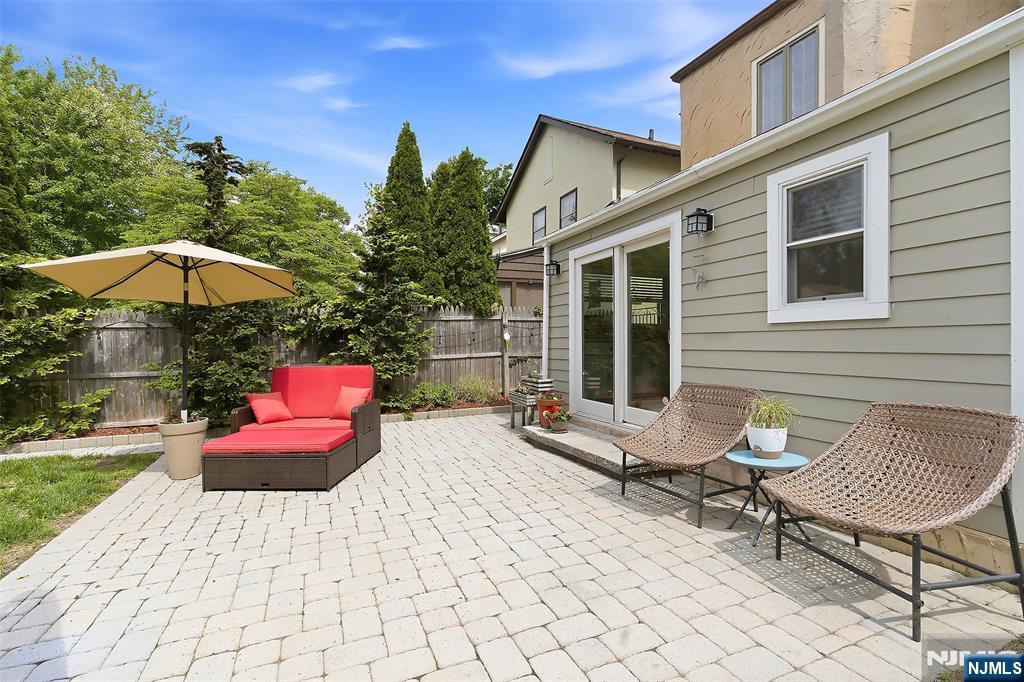 31 Martin Terrace Hackensack, NJ 07601 - Photo 29 of 32 a view of a patio with a table and chairs