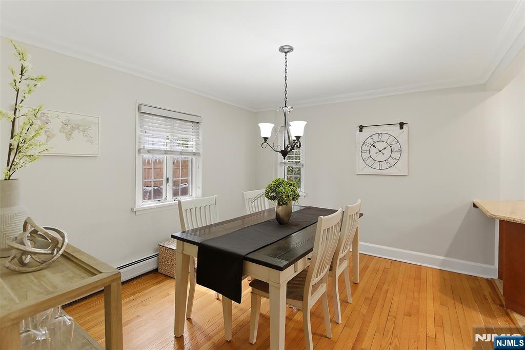 31 Martin Terrace Hackensack, NJ 07601 - Photo 7 of 32 a view of a dining room with furniture and wooden floor