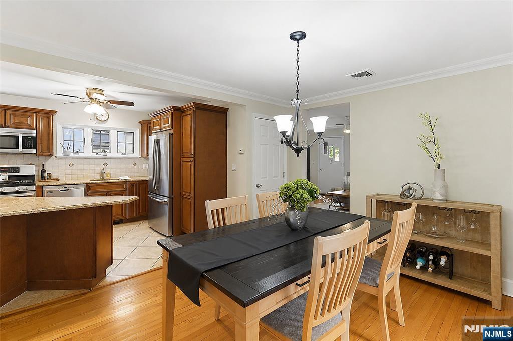 31 Martin Terrace Hackensack, NJ 07601 - Photo 8 of 32 a view of a dining room with furniture and wooden floor