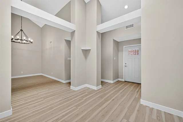 a view of a livingroom with wooden floor
