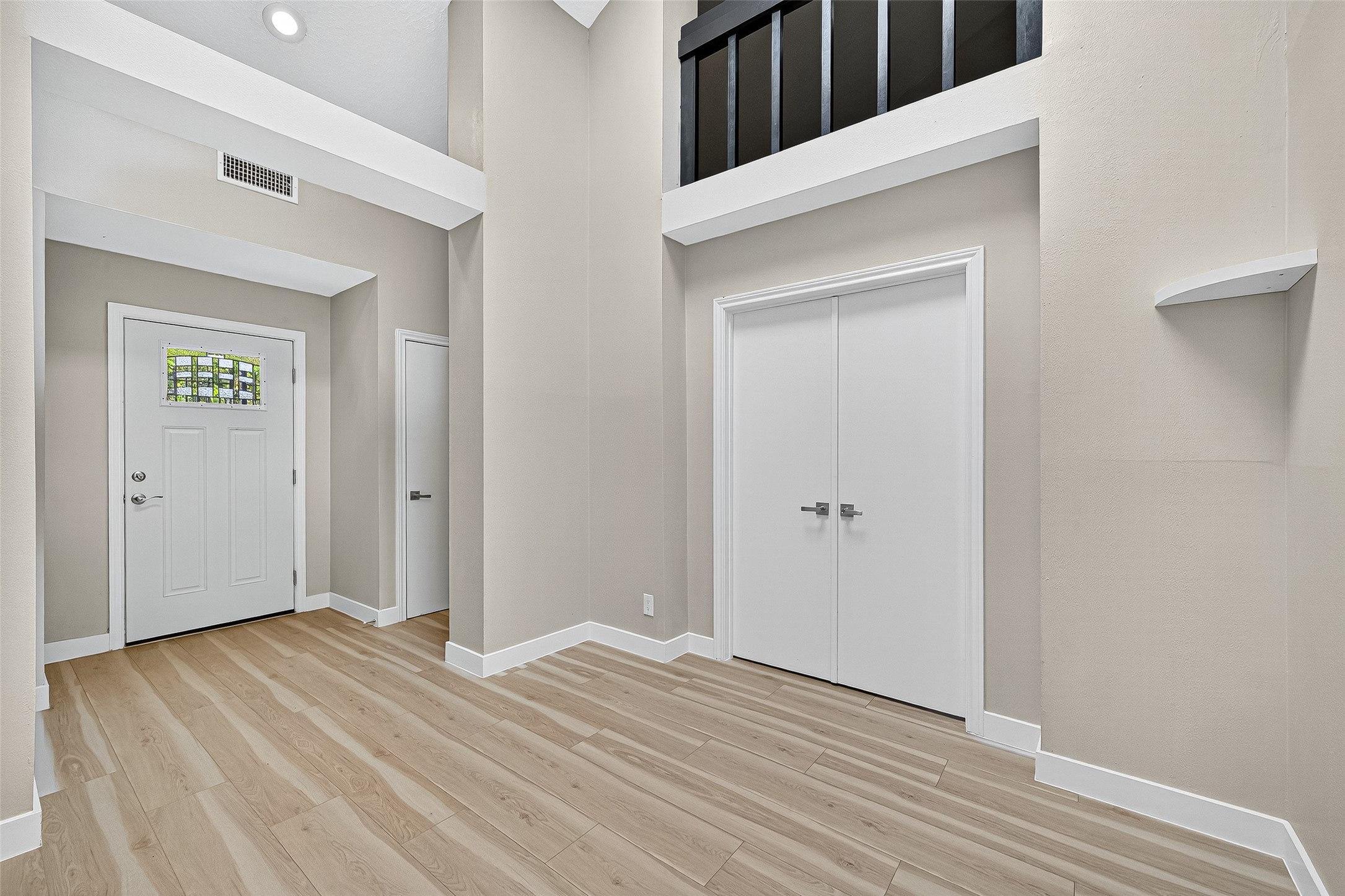 2026 Ashford Hollow Lane Houston, TX 77077 - Photo 11 of 35 a view of a livingroom with wooden floor