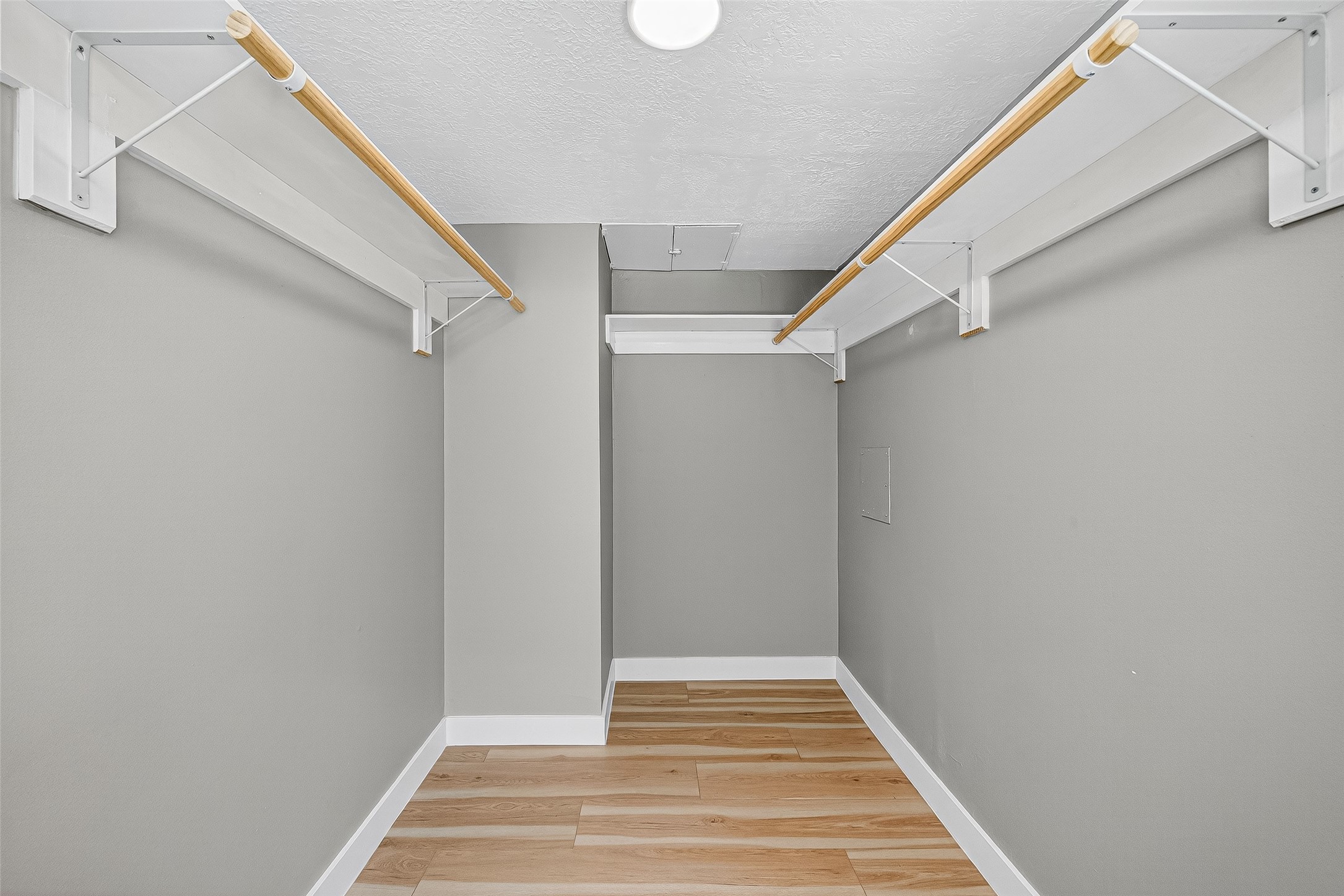 2026 Ashford Hollow Lane Houston, TX 77077 - Photo 17 of 35 a view of an empty walk in closet