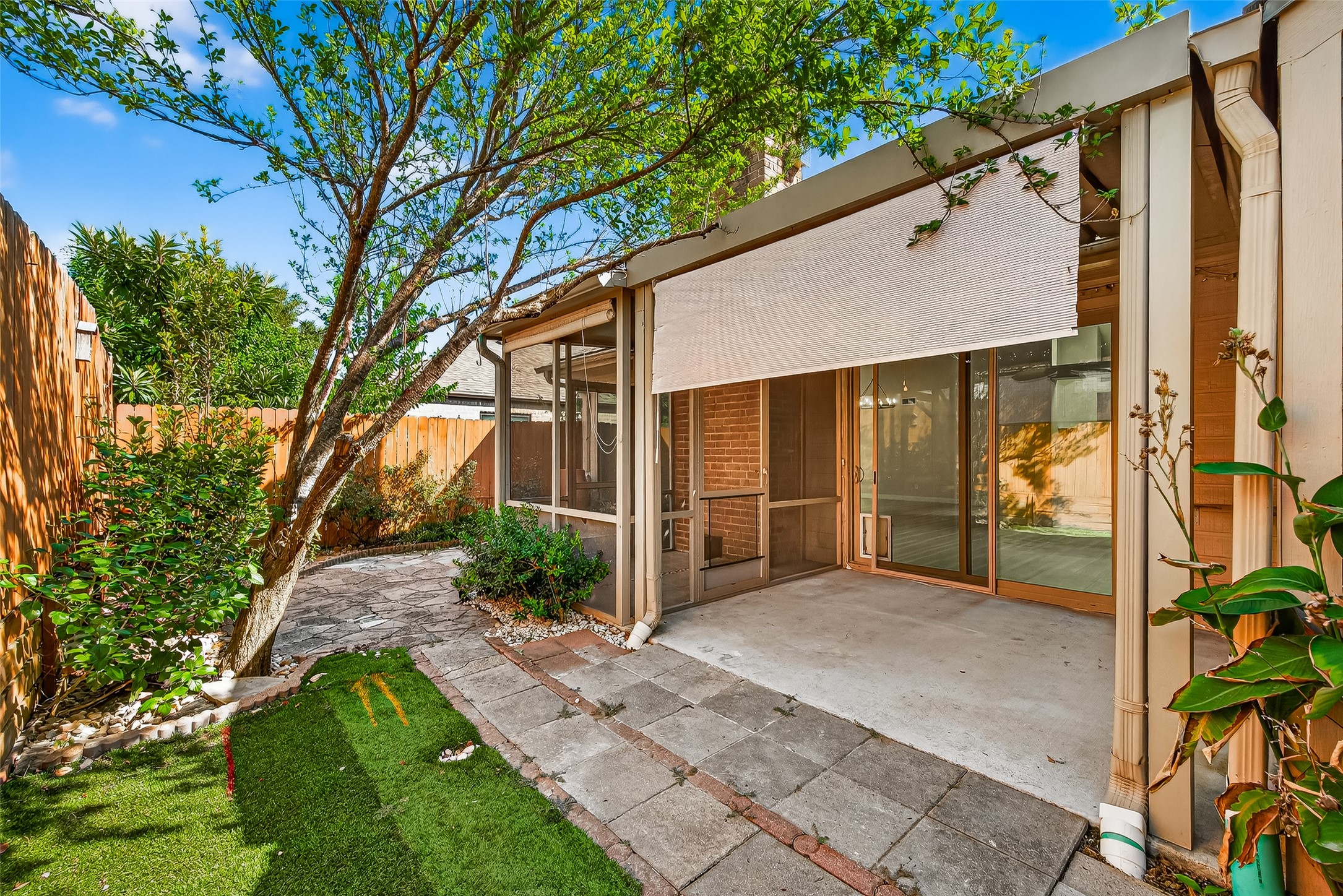 2026 Ashford Hollow Lane Houston, TX 77077 - Photo 28 of 35 a view of a house with backyard and garden