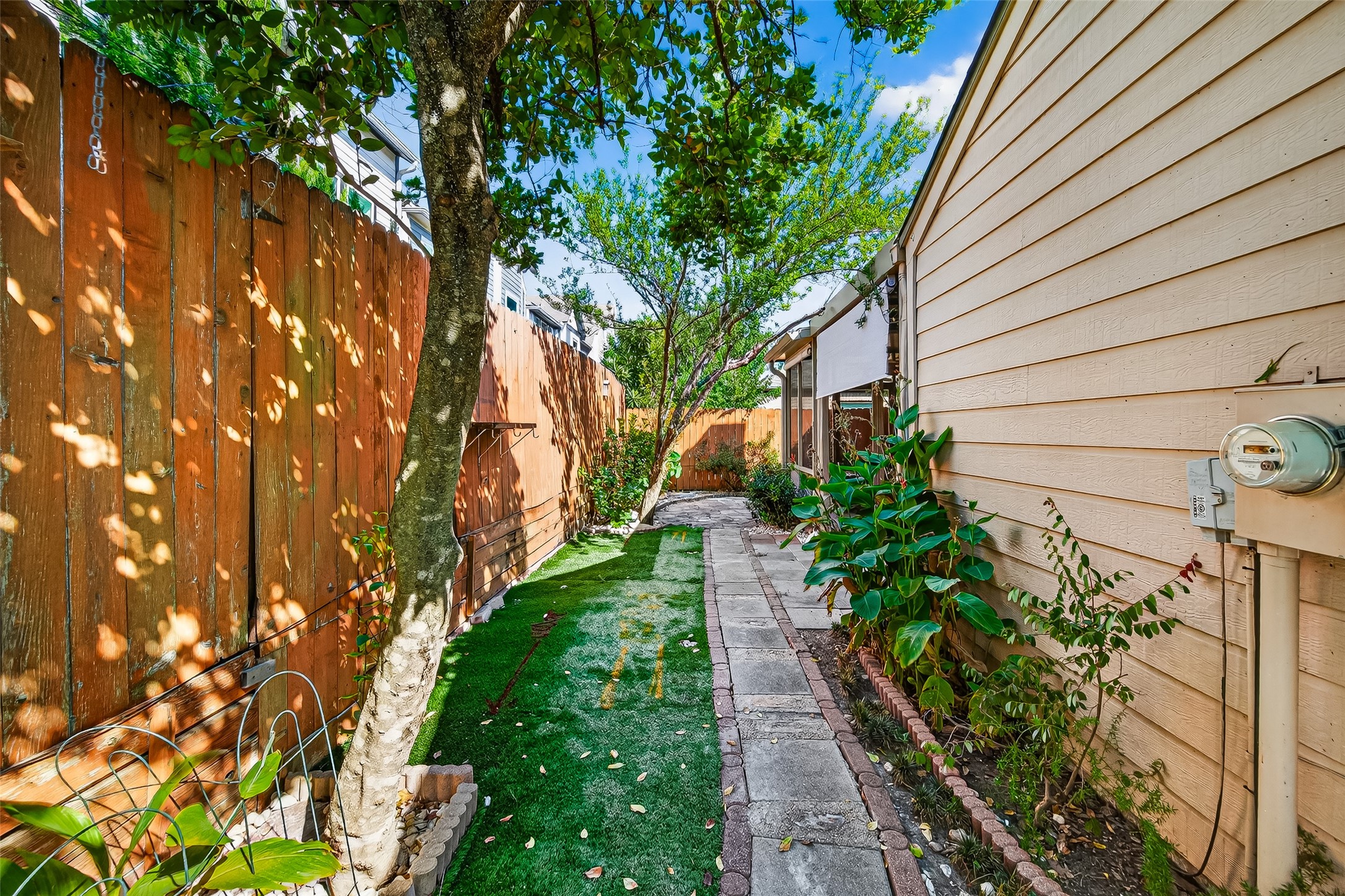 2026 Ashford Hollow Lane Houston, TX 77077 - Photo 31 of 35 a view of a pathway with a tree