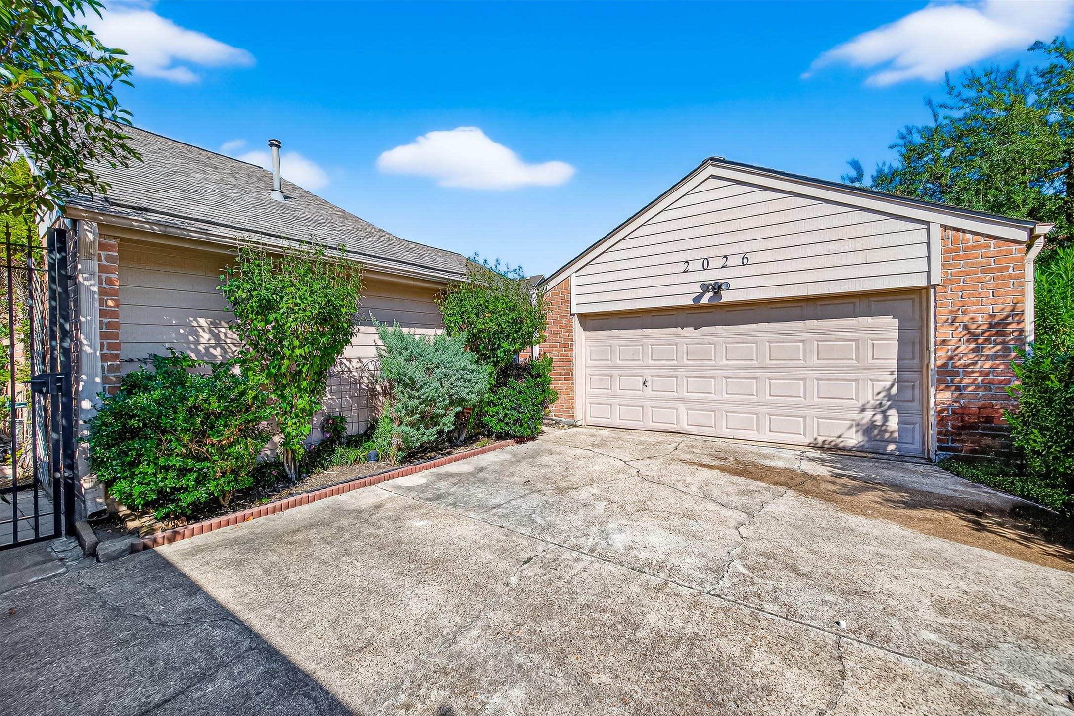 2026 Ashford Hollow Lane Houston, TX 77077 - Photo 33 of 35 a front view of house with yard