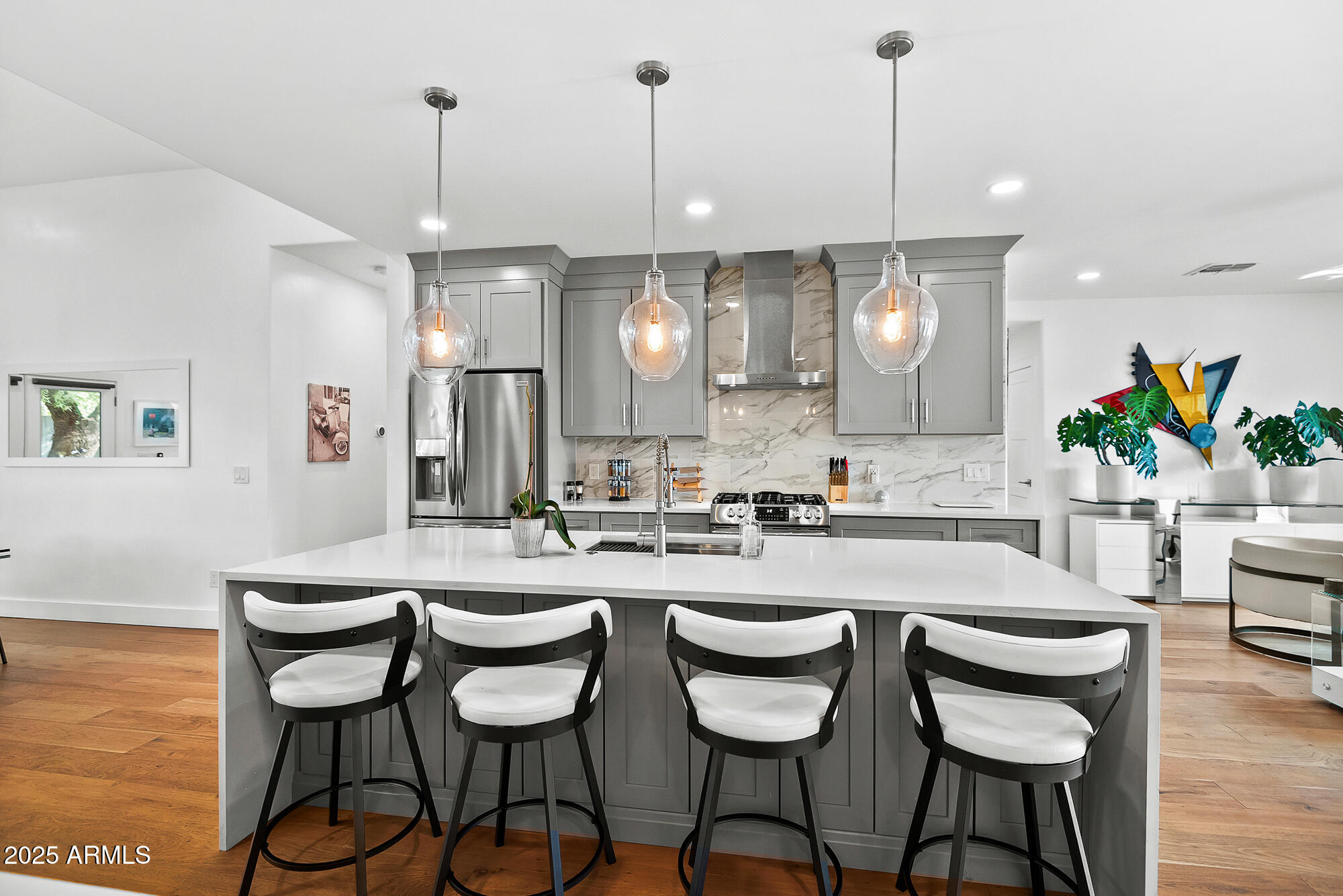 4526 East Heatherbrae Drive Phoenix, AZ 85018 - Photo 10 of 34 a kitchen with a dining table and chairs