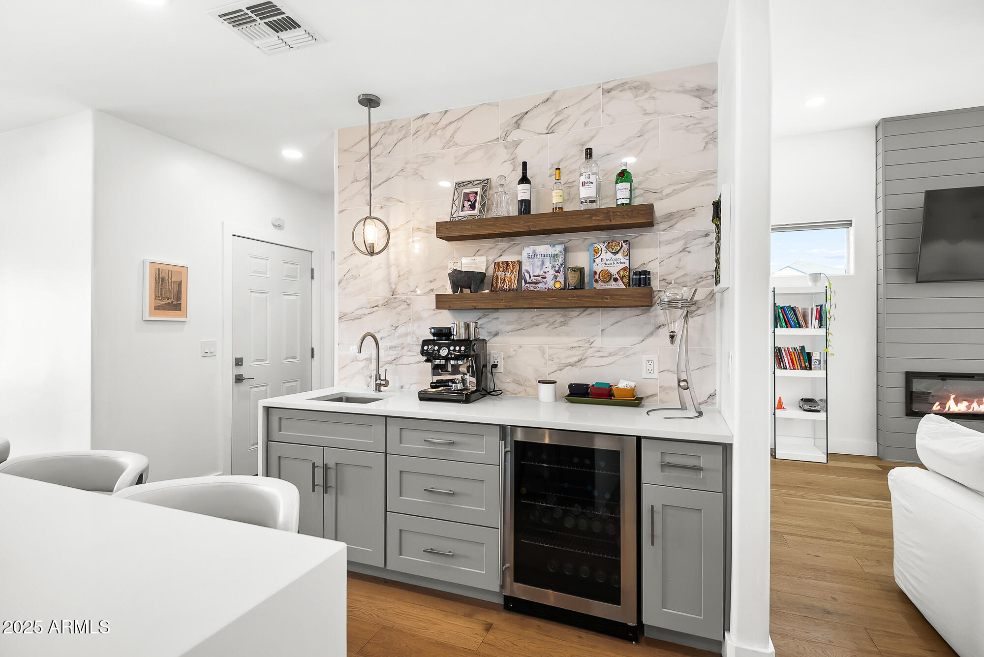 4526 East Heatherbrae Drive Phoenix, AZ 85018 - Photo 12 of 34 a view of kitchen with cabinets and wooden floor